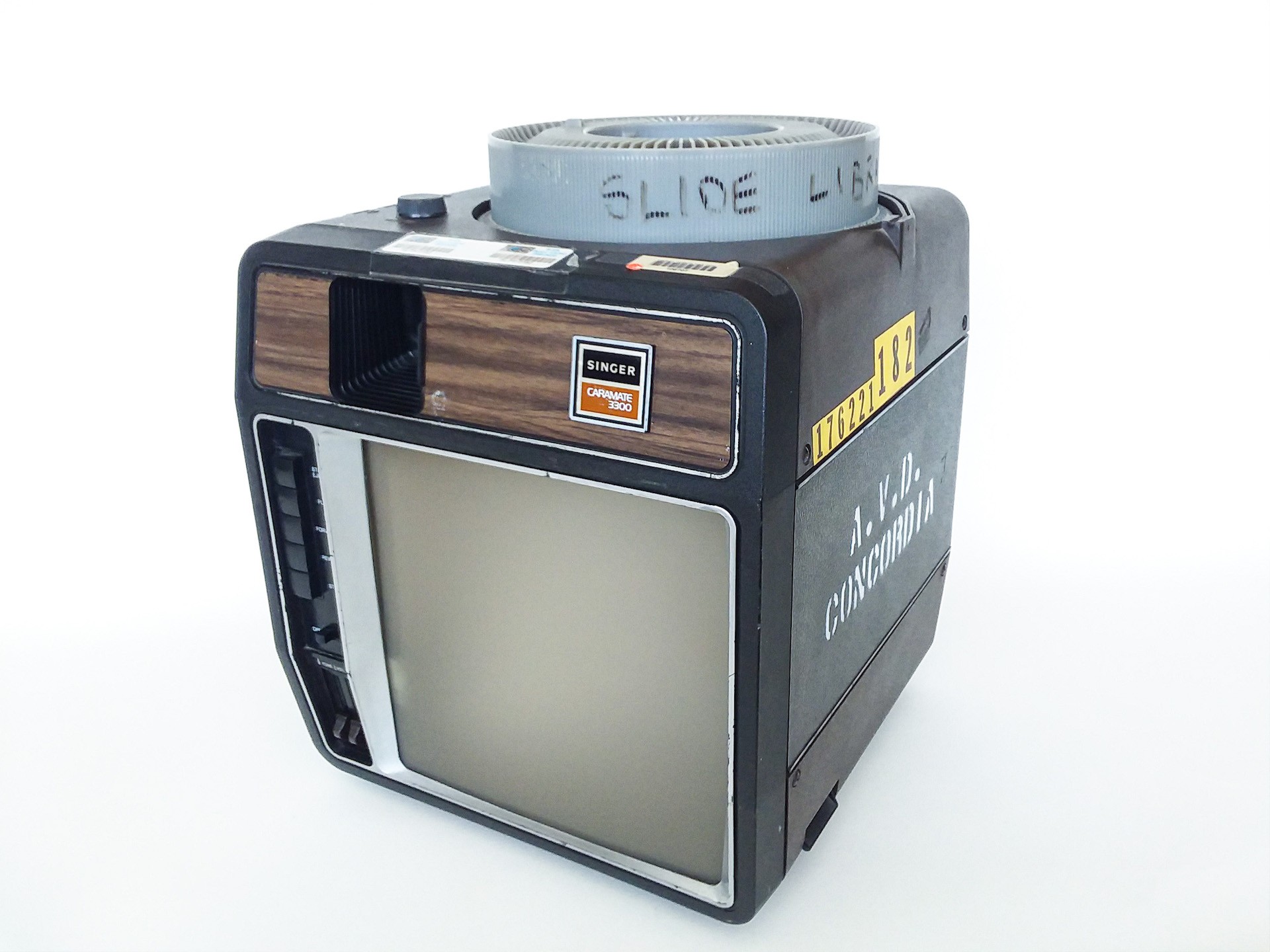 a Singer Caramate 3300 carousel slide projector