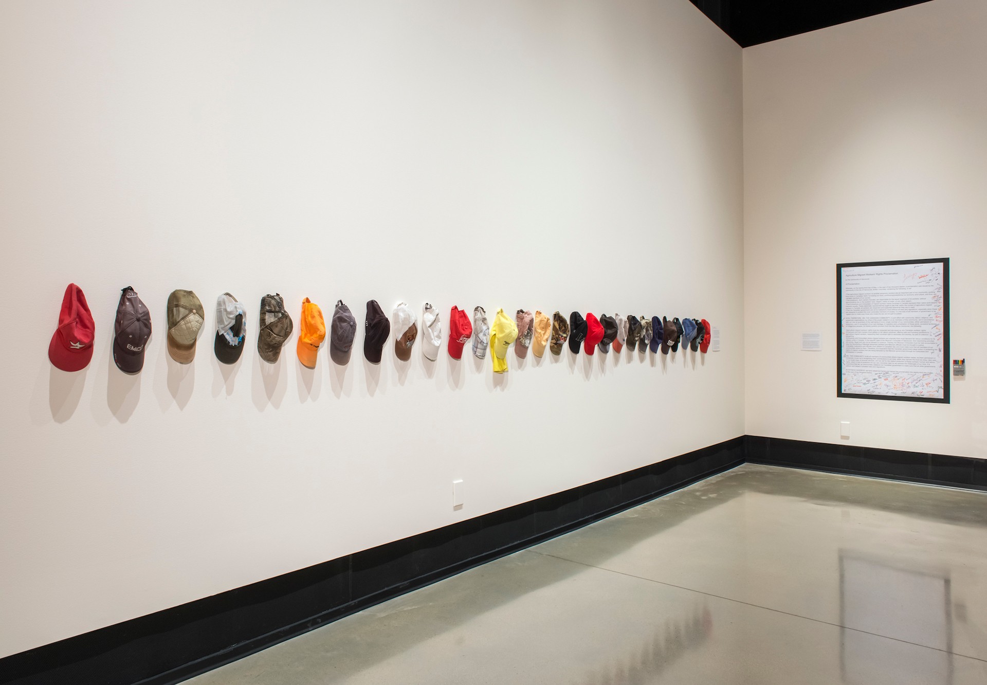 Workers’ caps used during their labour days, a photo of Carlos Colín's exibit, "12 hrs. por día,"