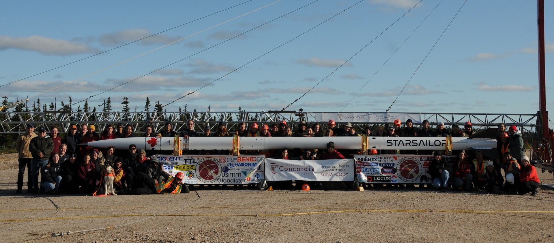 Space Concordia students and Mistissini community gather for a photo with the Starsailor rocket
