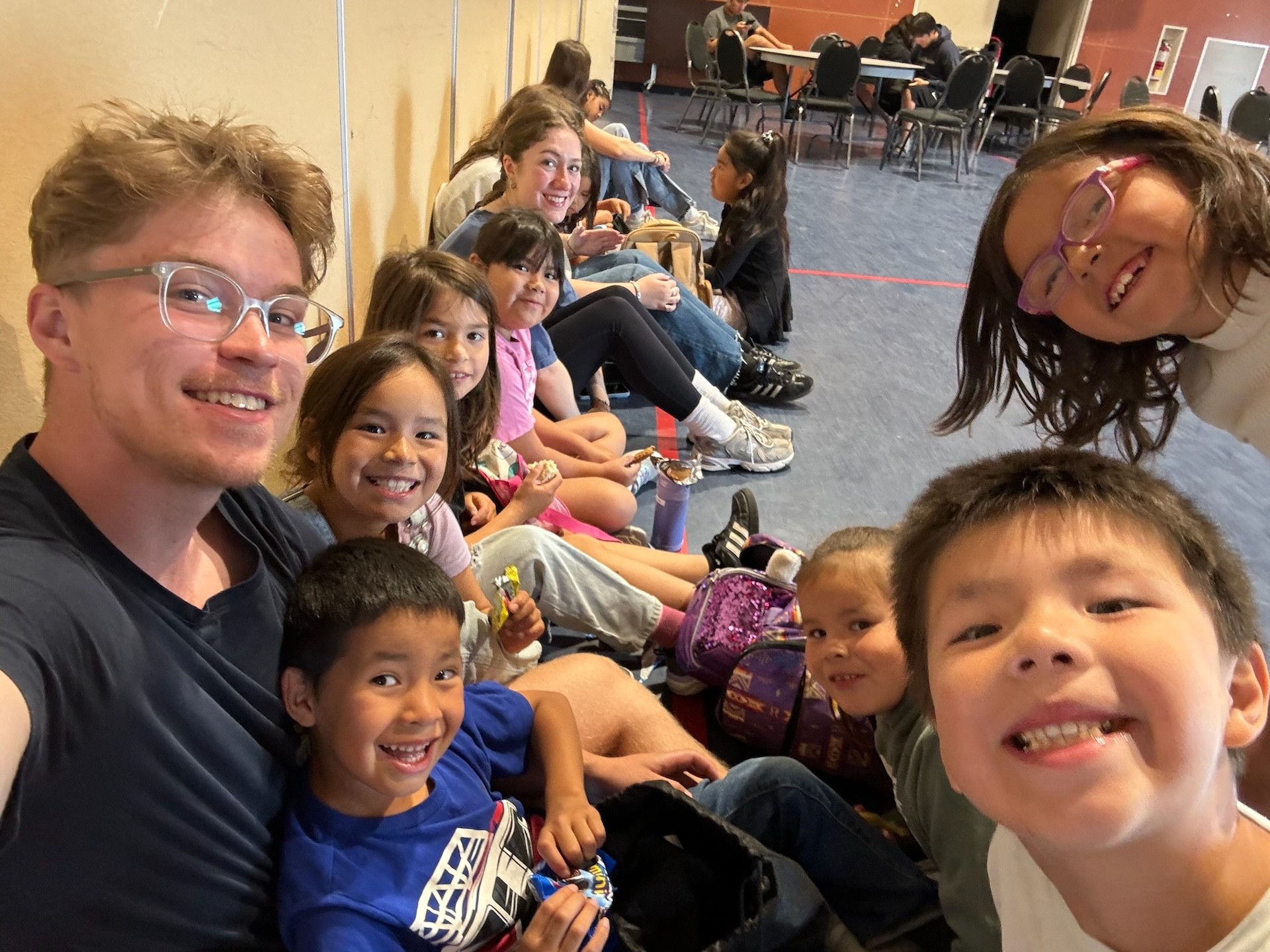 Space Concordia student smiled with Mistissini community children