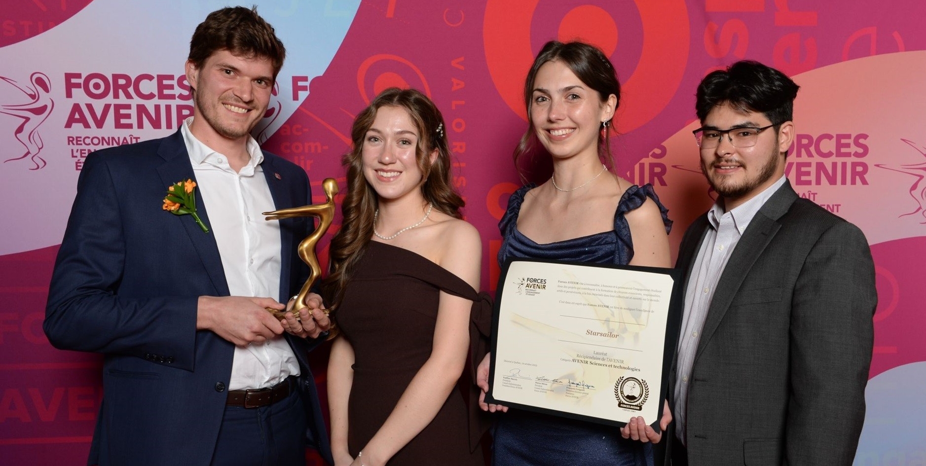 Four Space Concordia students pose together at the Forces AVENIR gala in Quebec City, holding the Science and Technology Prize trophy and certificate for their Starsailor project.