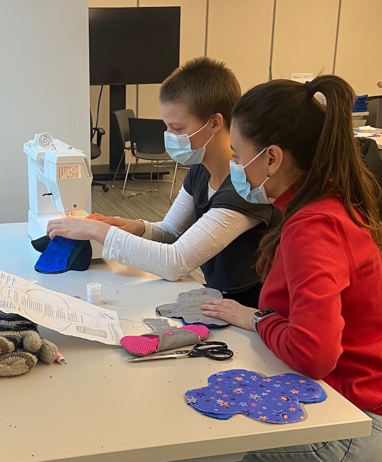Students at the sew your own pad event