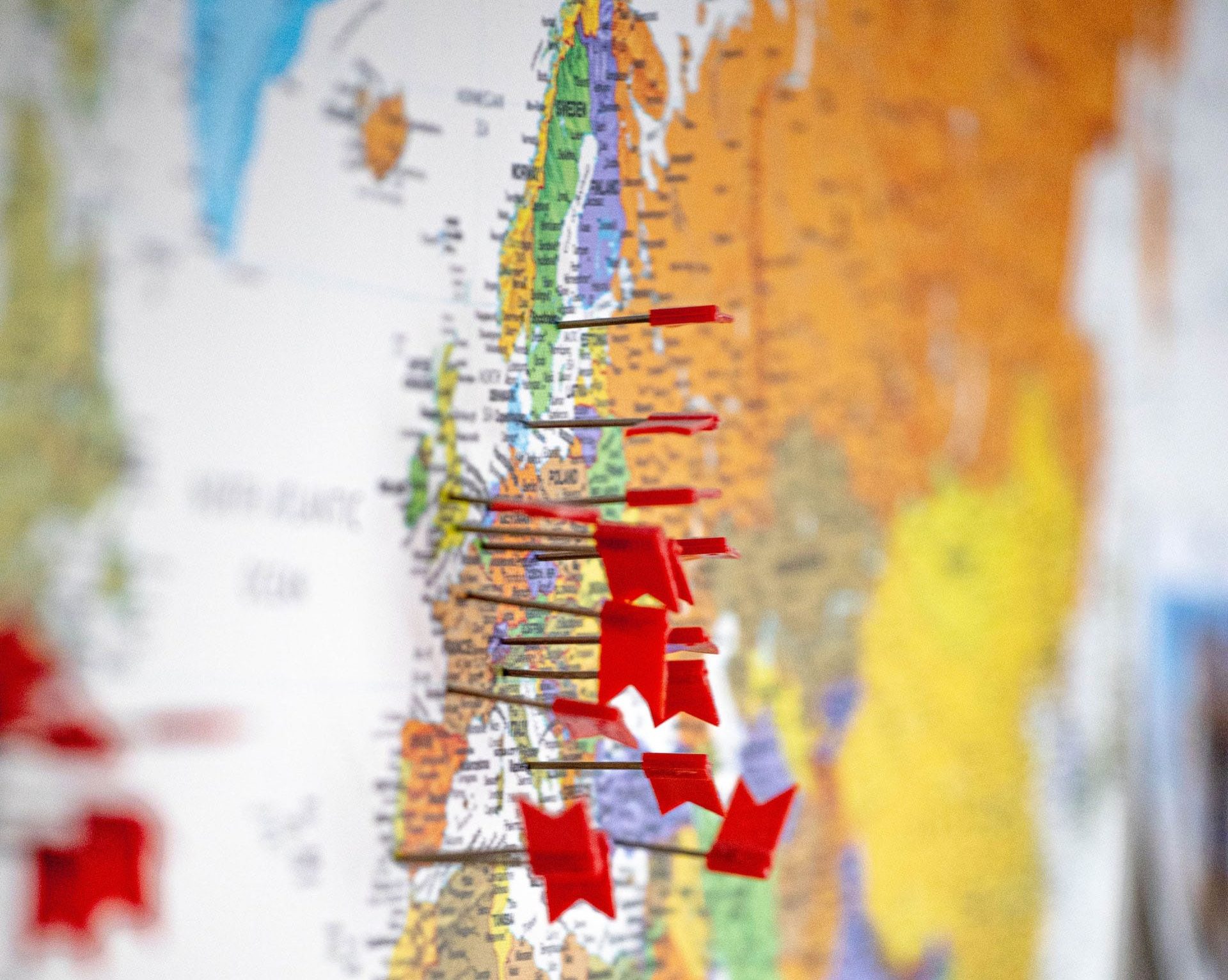 Close up map of Europe marked with flag pins