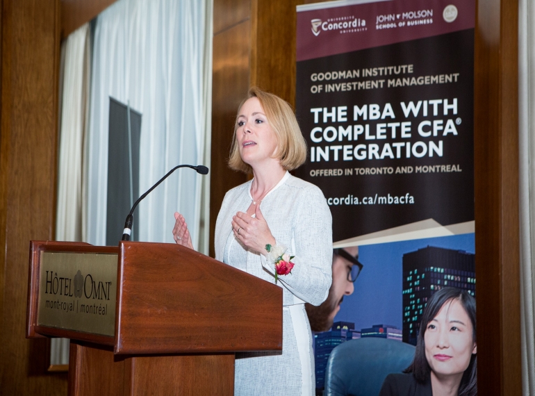 Goodman MBA in investment management podium speaker