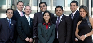 A speaker presents at the MBA International Case Competition