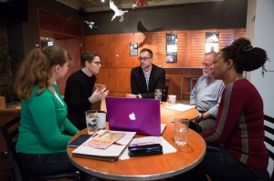 A speaker presents at the MBA International Case Competition