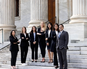 A speaker presents at the MBA International Case Competition