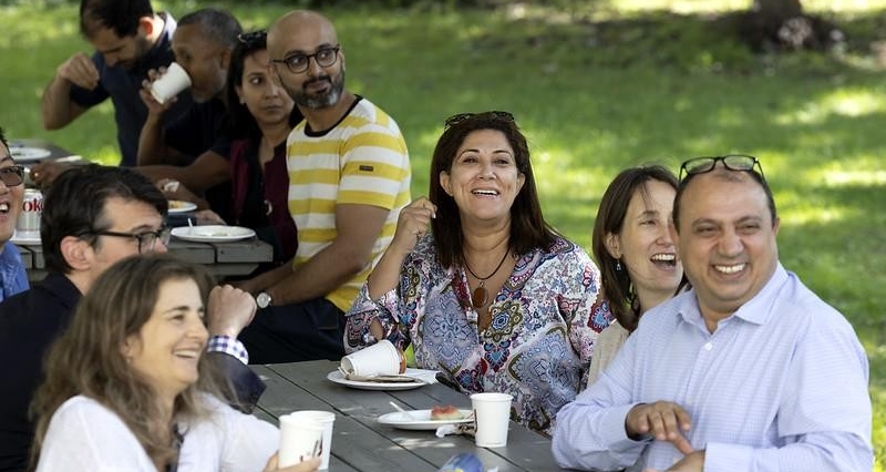 Staff and faculty at a picnic table