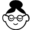 person with bun and glasses