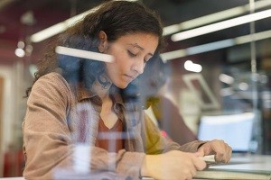 A female student studying in the library 