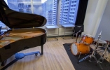 Thumbnail of the improvisation rehearsal space with piano and drums