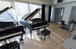 Thumbnail of a classical music studio with two pianos