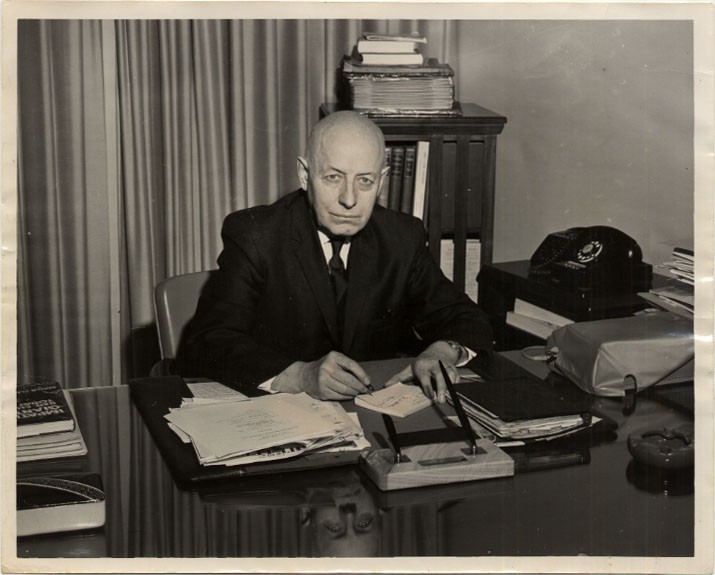 Henry F. Hall at his desk