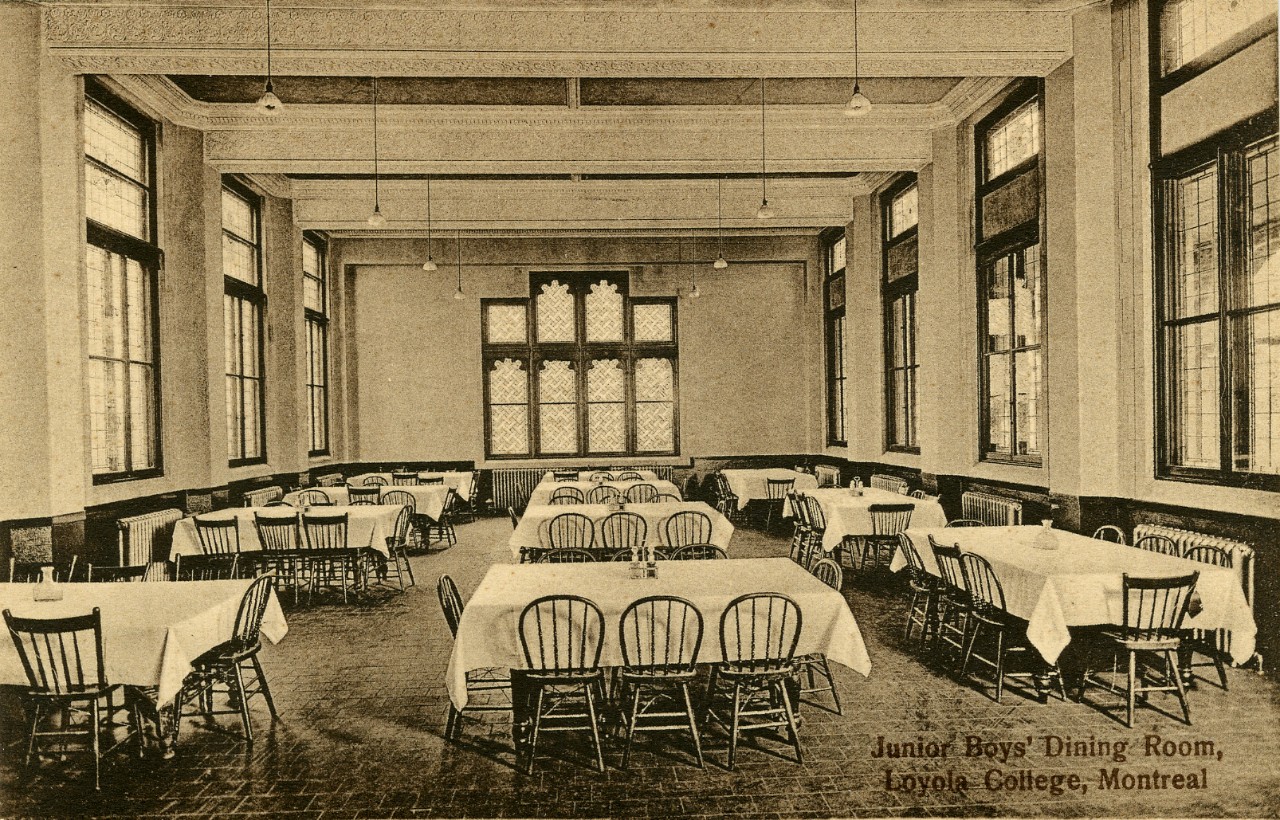 Old black and white photo of the Junior Boys dining room, Loyola College