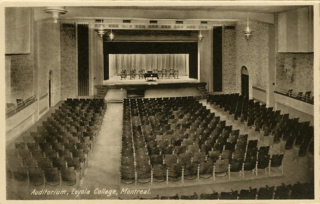Old black and white photo of an auditorium at Loyola College