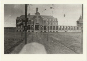 Old photo of the Refectory building decorated for the Garden Party Day