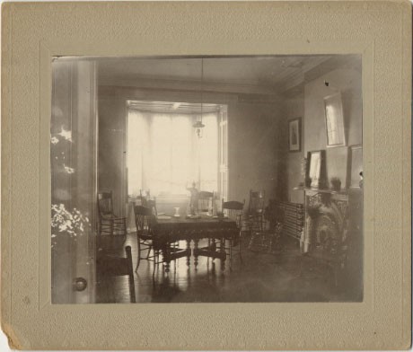 Old black and white photo of the parlour of old Loyola College in daylight from 1896