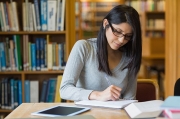 Woman studying in the library