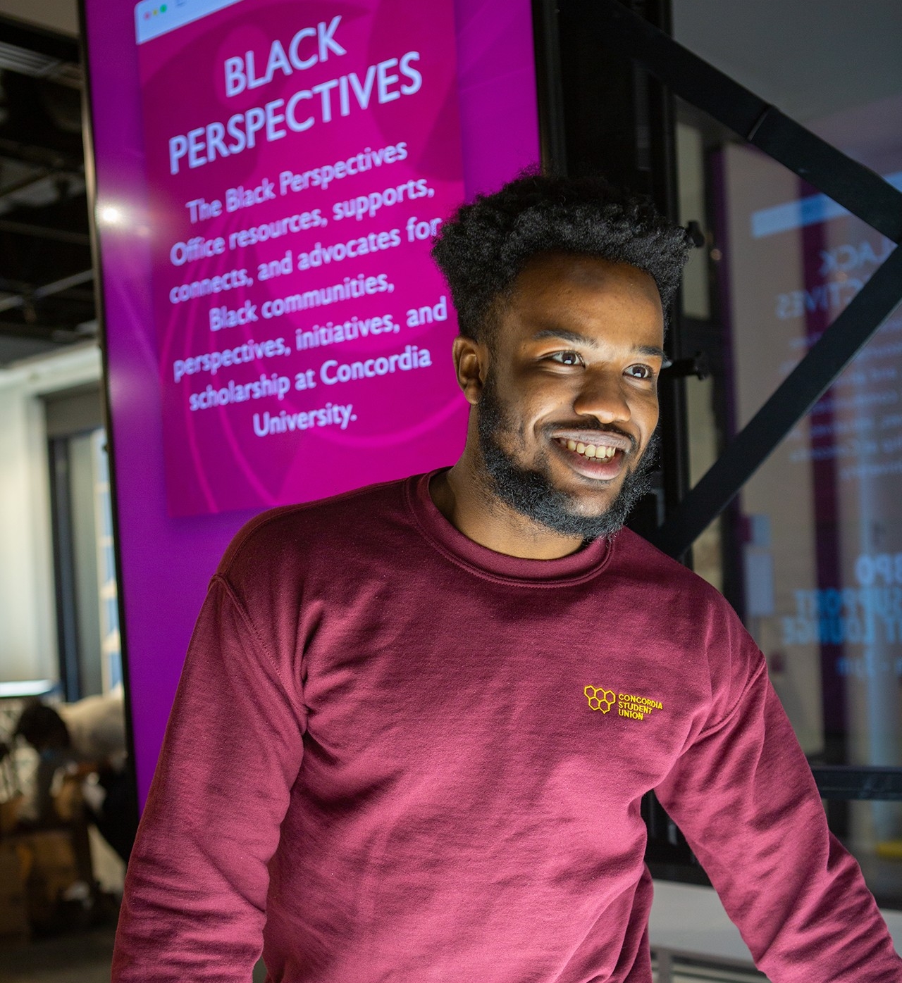 A black student wearing a Concordia Student Union sweater.