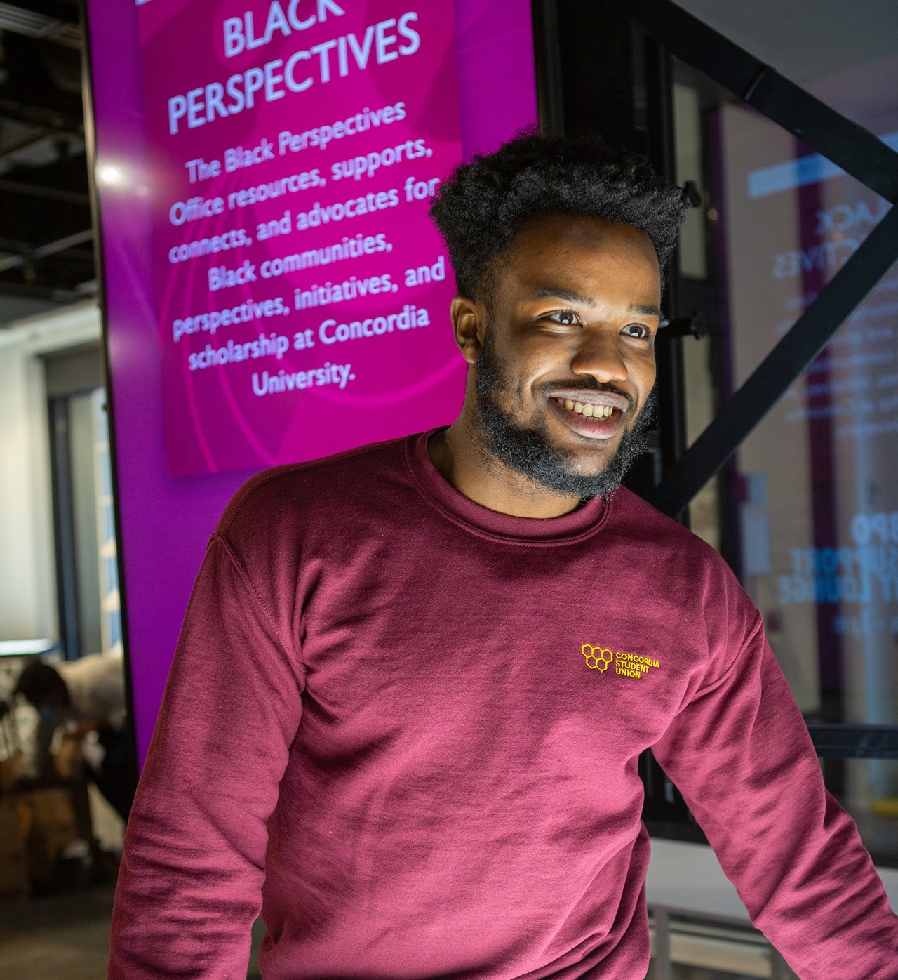 A black student wearing a Concordia Student Union sweater.