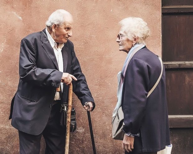 A senior man and woman meeting