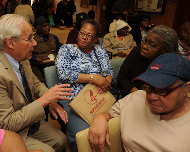 A group of people in discussion at an event