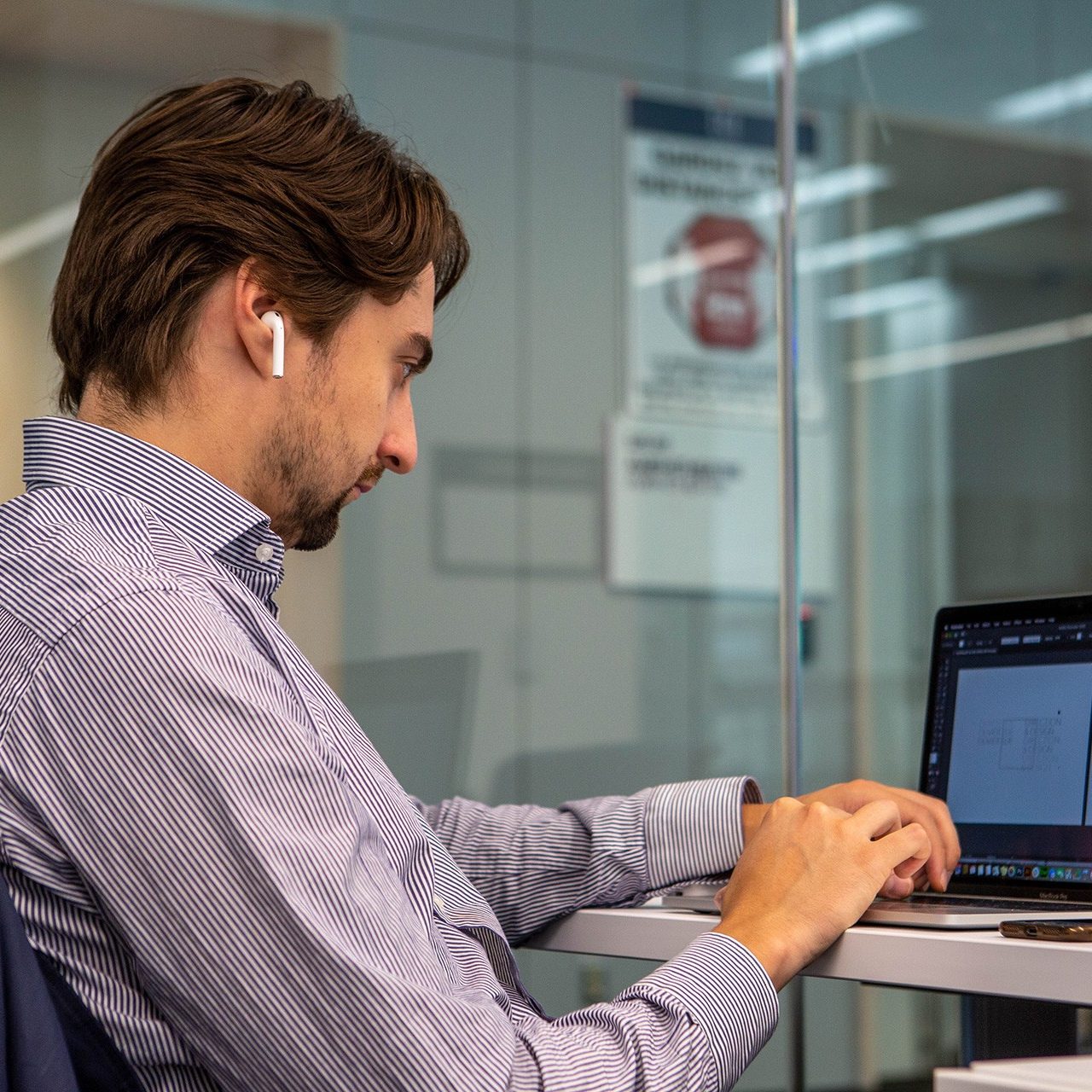 Man works on a laptop