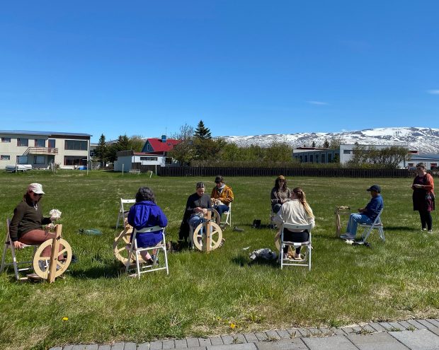 students outside weaving in Iceland
