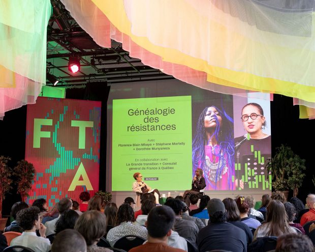 photo of a speaker in front of a crowd at the Montreal Festival TransAmeriques