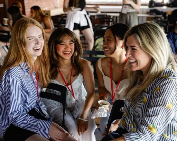 A group of students and Prof. Salas sitting and laughing.