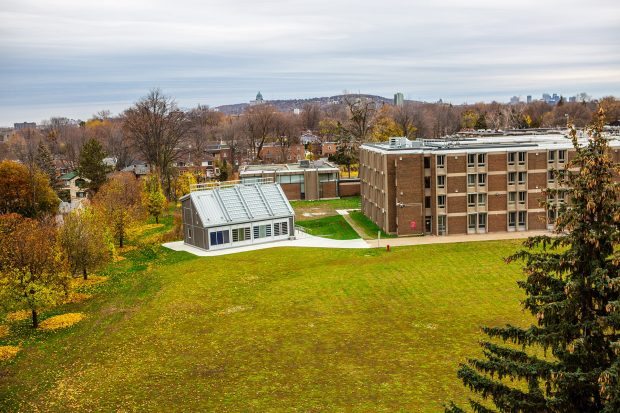 An aerial view of Hingston Hall in the autumn, surrounded by fall colours.