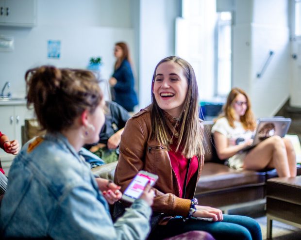Concordia students relax with friends in the Grey Nuns residence lounge
