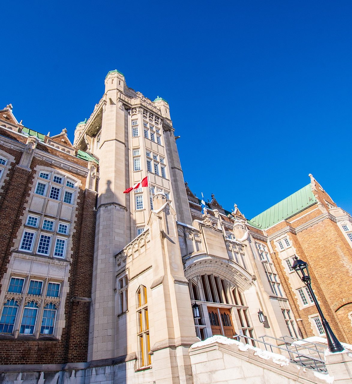 The entrance to an ornate heritage building on Concordia University's Loyola Campus on a sunny day