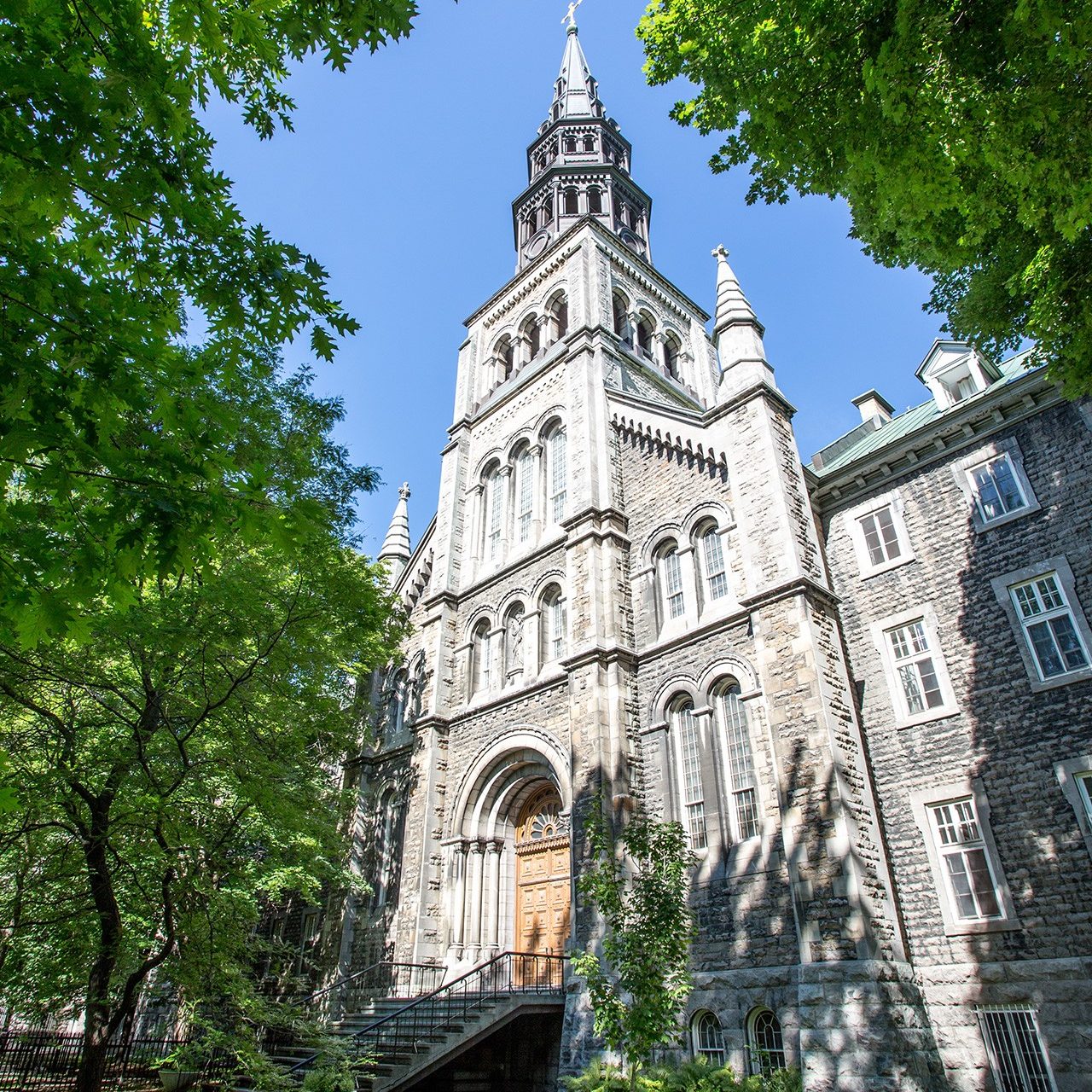 The entrance and facade of Concordia University's historic Grey Nuns residence on a sunny summer day