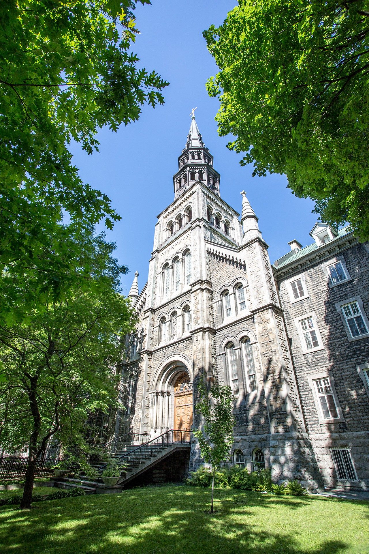 The ornate entrance and facade of Concordia University's historic Grey Nuns residence on a sunny day