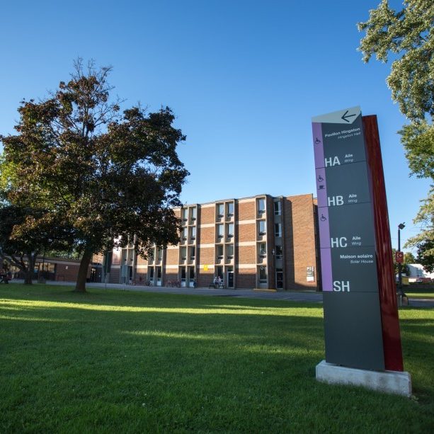 A sign on Concordia University's Loyola Campus shows the direction to Hingston Hall buildings