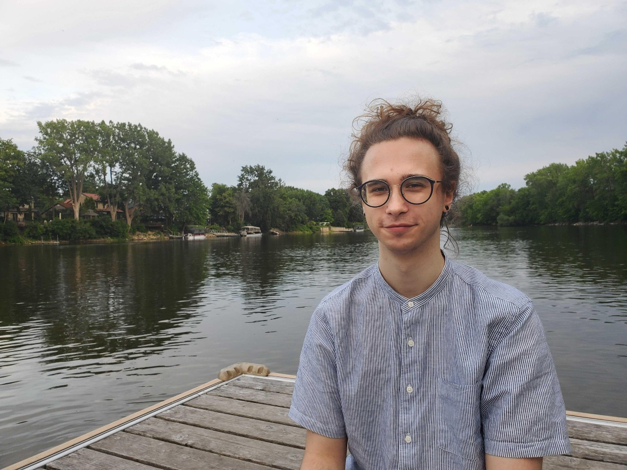 Josh mentor sitting on the waterfront.