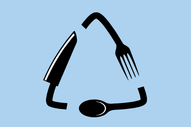 An image of a Sustainability Champion Award winner with their wooden award