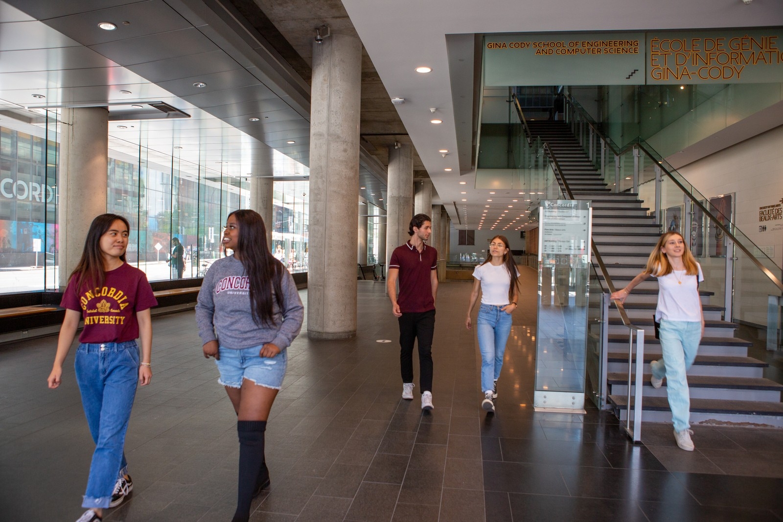 Students walking through the lobby of the Engineering complex