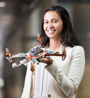 Headshot crop in an image & text component. The image is taller than it is wide.