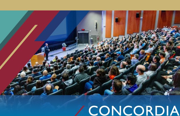 Audience attending a presentation in an auditorium, with Michael Di Grappa speaking near a screen displaying, "Our Vision: Here to elevate Concordia's success. Always."
