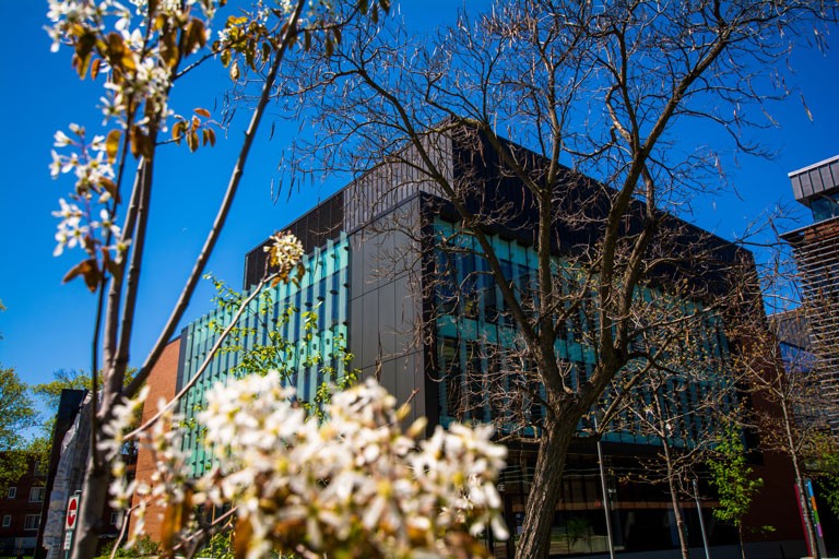 The Genomics Building on Loyola Campus in spring
