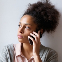 Woman speaking on a cell phone