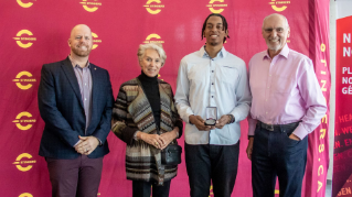 From left: Stingers football coach Brad Collinson, Inez Lengvari, Stingers football player Malick Sylvain, George Lengvari