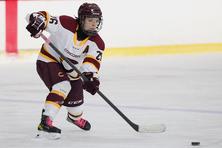 Defender Brigitte Laganiere earns her first national award.