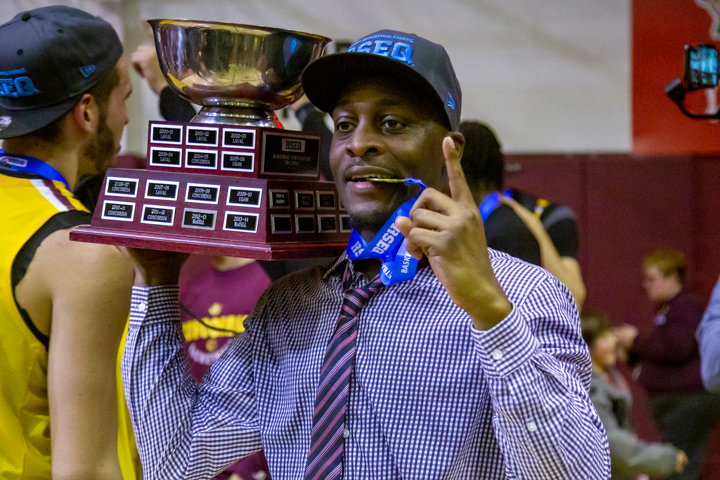 Damian Buckley celebrates his first conference championship as a Stinger coach.