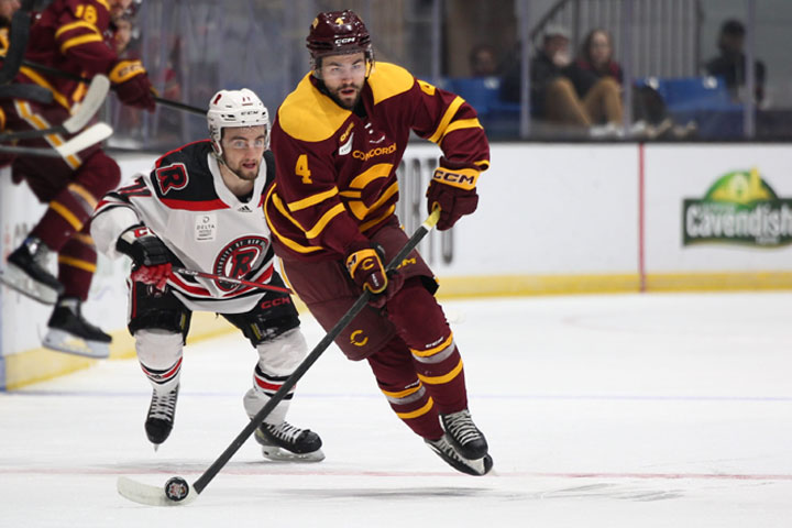 Stinger rookie Samuel Desgroseilliers stays a step ahead of UNB in Thursday night's game.