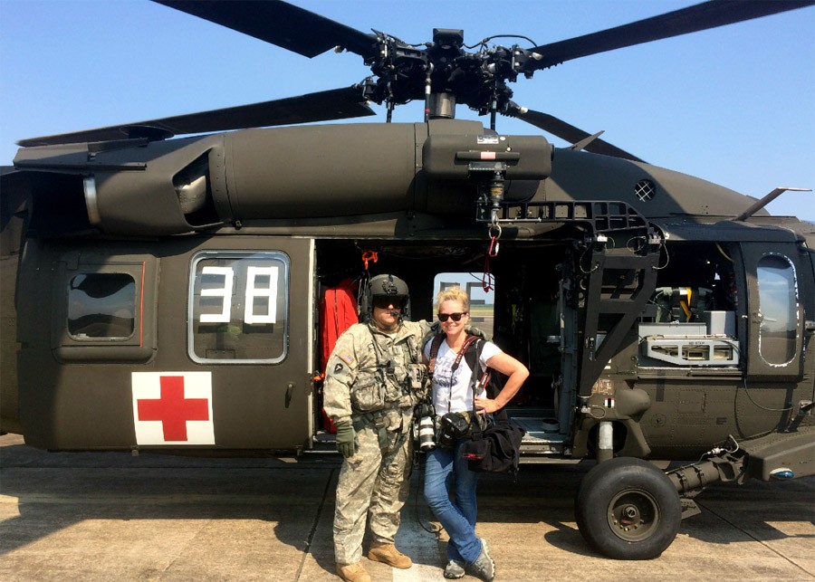 Barbara Davidson and member of the Texas National Guard