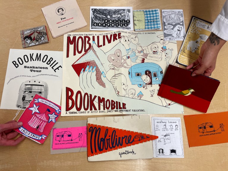 Series of printed items that read MOBILIVRE and BOOKMOBILE