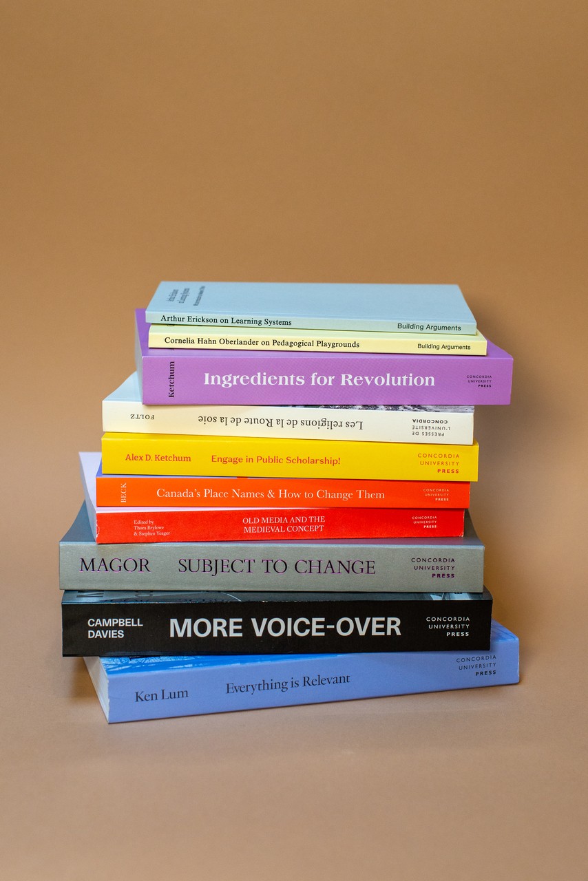 A stack of CU Press titles against a beige background